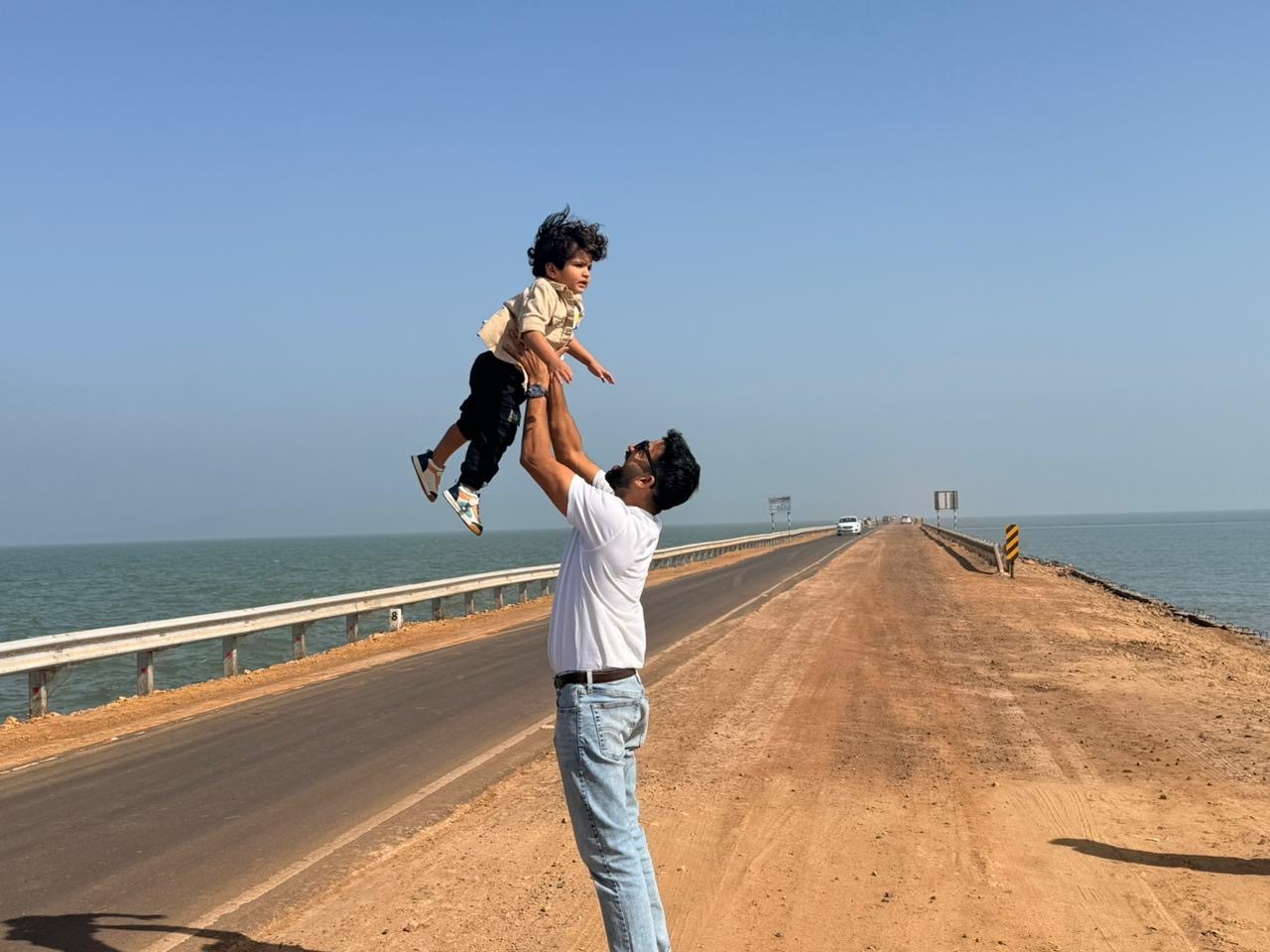 pai pegando seu filho